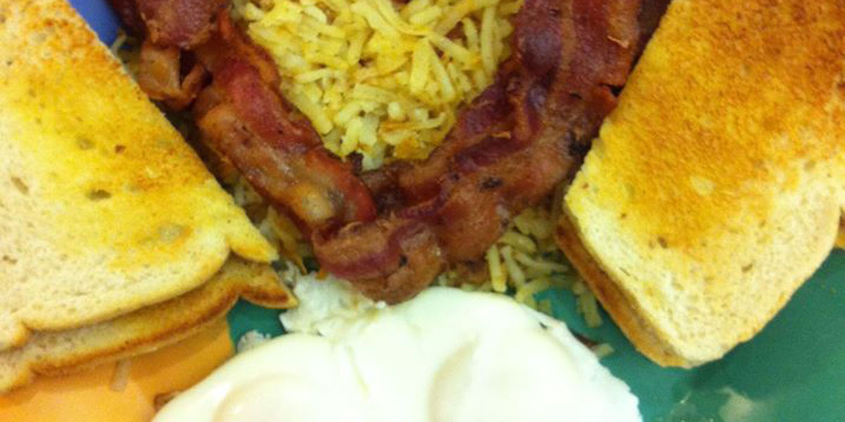 Broadway Cafe bacon breakfast toast over easy eaggs hash browns